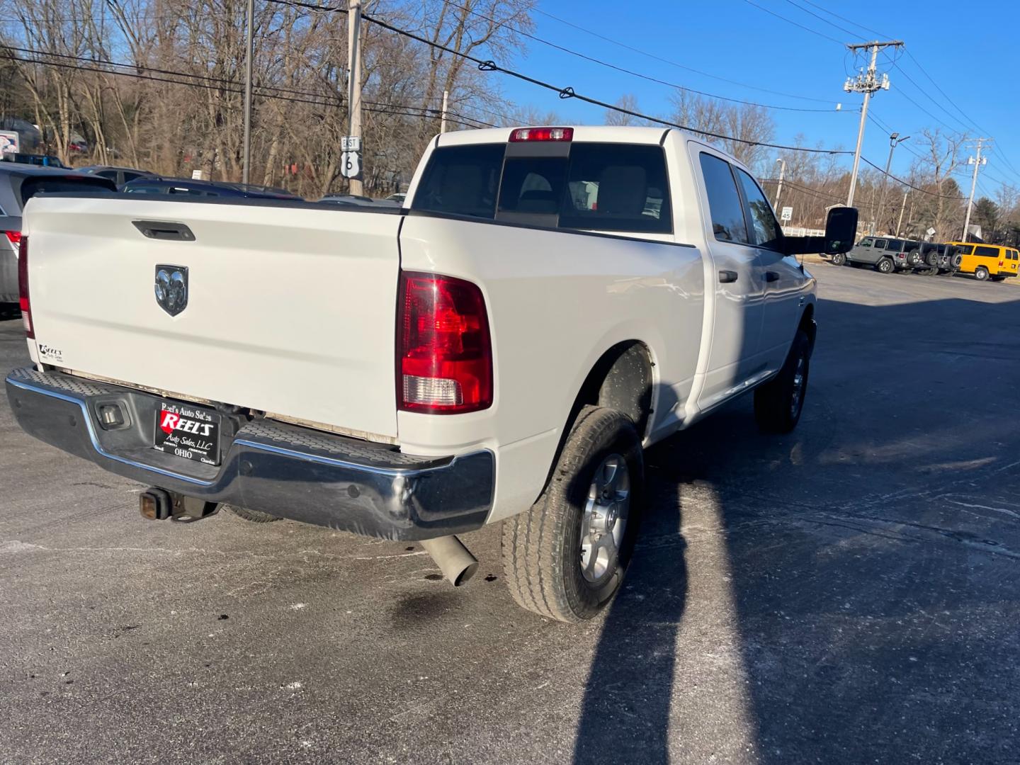 2016 White /Black RAM 2500 Outdoorsman Crew Cab SWB 4WD (3C6UR5DL4GG) with an 6.7L I6 OHV 24V TURBO DIESEL engine, 6A transmission, located at 11115 Chardon Rd. , Chardon, OH, 44024, (440) 214-9705, 41.580246, -81.241943 - Photo#8